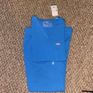 Brand new blue Figs set